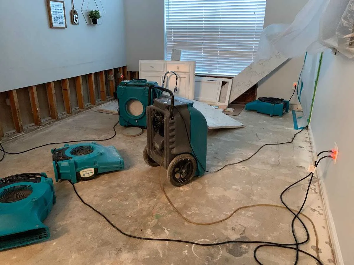 Dehumidifier in flood-cut room for Water Damage Restoration in Robeson